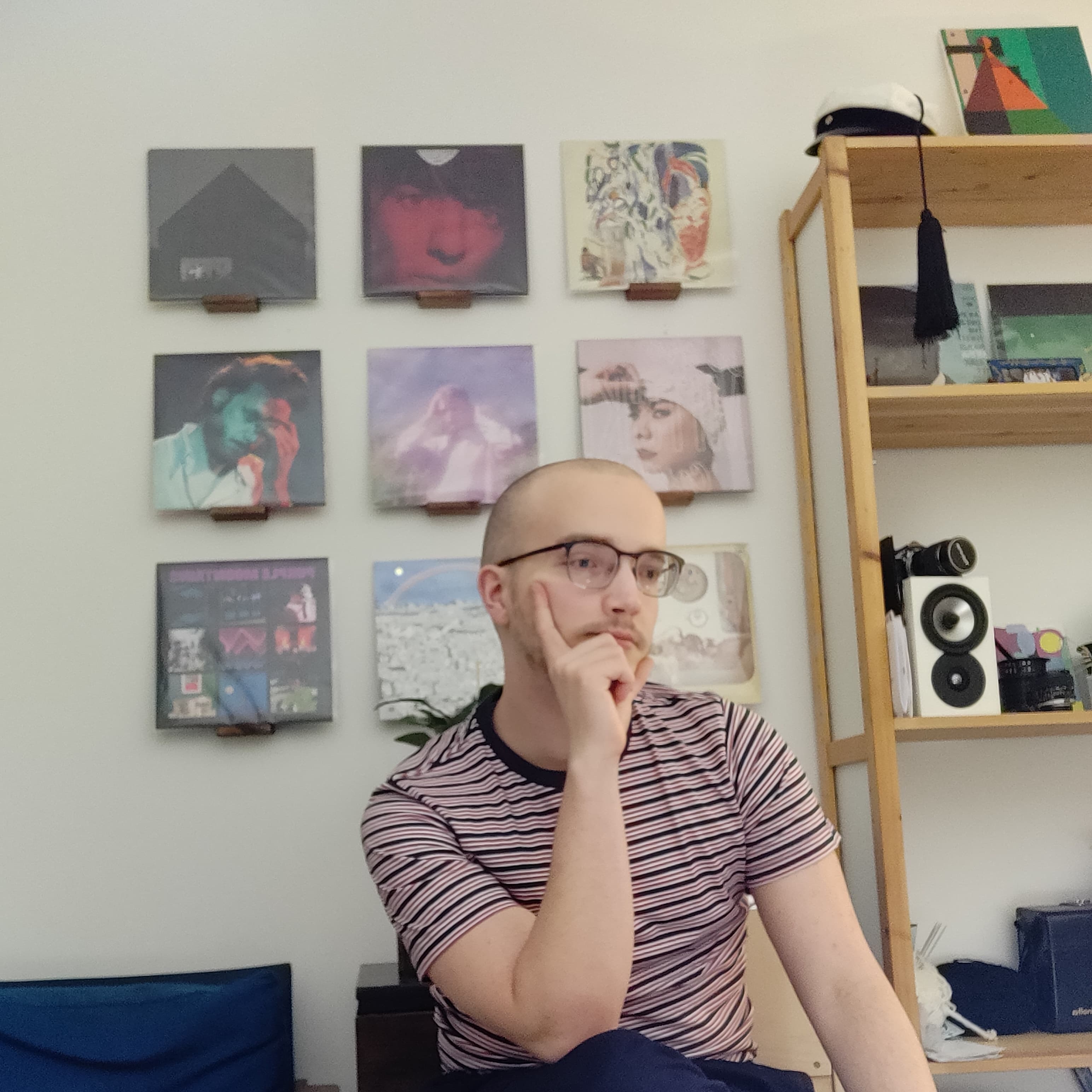 juha's face and his wall of lps